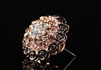 Brooch with flowers and gems on black