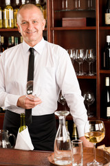 Wine bar waiter happy male in restaurant