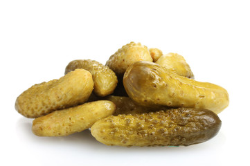 Marinated cucumbers on the plate isolated on white