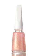 Beige nail polish with sparkles isolated on white