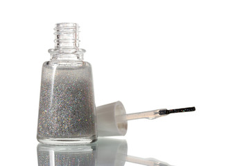 Silver nail polish with sparkles isolated on white