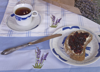 Hot tea with lavender and jam