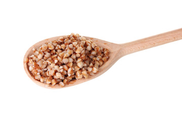 Wooden spoon with boiled buckwheat isolated on white