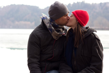 A Sweet Young Couple Kissing