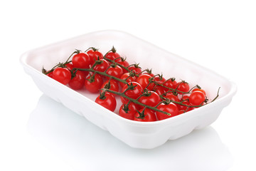 cherry tomatoes in packaging isolated on white
