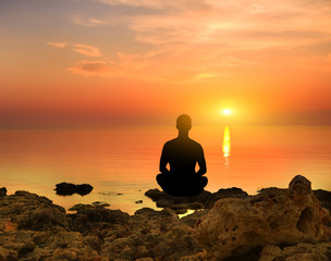 Silhouette of the meditating
