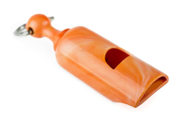 Orange plastic whistle