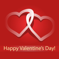 Two paper hearts on red background