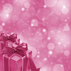 Fototapeta premium Pink gift boxes on abstract pink glitter background