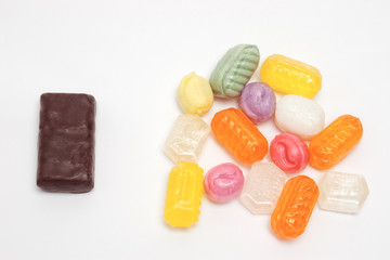 multicolored caramel candies and chocolate bonbon