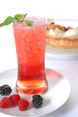 Fototapeta na wymiar Berries Cocktail with Fresh Mint