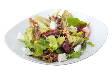 Salad of roasted beets with goat cheese and pine nuts