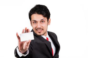 portrait of arab businessman holding visiting card