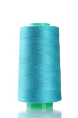 Blue bobbin thread isolated on white