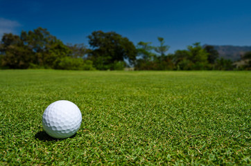 a glof ball in  a beatiful view