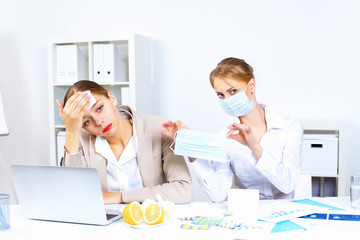 Fototapeta premium People with cold and flu at work place
