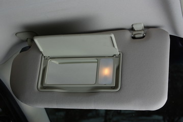 Sun visor with mirror in a car