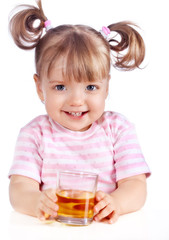 little girl drinking apple juice