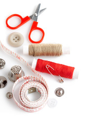 tools for needlework thread scissors and tape measure isolated