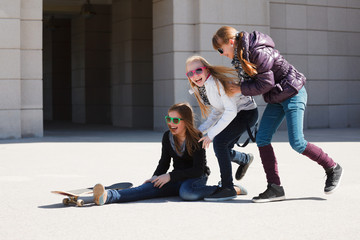 Teenage girls with skateboard