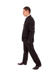 Young business man walking
