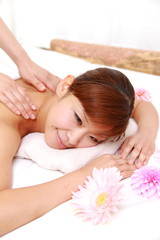 Fototapeta na wymiar young Japanese woman getting massage