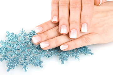Fototapeta premium hands with beautiful winter design and snowflakes isolated
