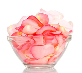 beautiful pink rose petals in glass bowl isolated on white