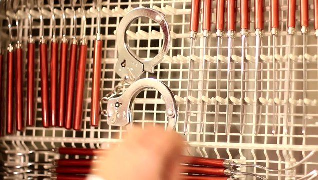 Dishwasher with Handcuffs - taking from appliance - top view