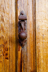 Closeup wood door with textured material
