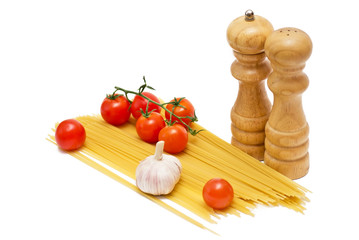 Spaghetti and tomatoes on a white background