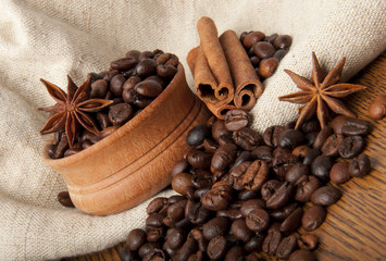 Fototapeta na wymiar Coffee grains, cinnamon and anise