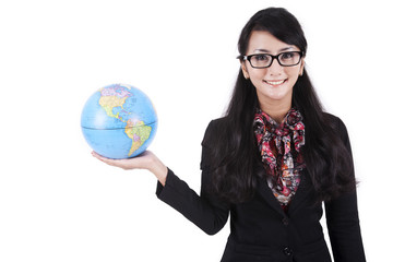 Fototapeta premium Businesswoman holding a globe