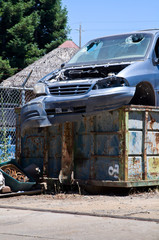 car in dumpster