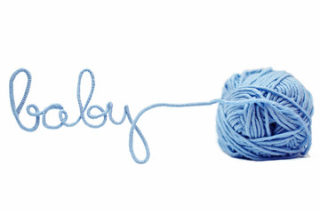 blue baby word made of yarn isolated on white