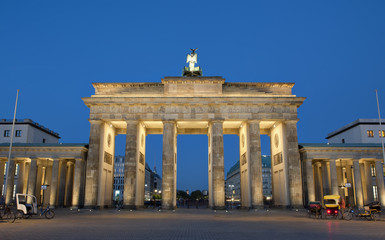 Brandenburg gate illuminated at night in Berlin