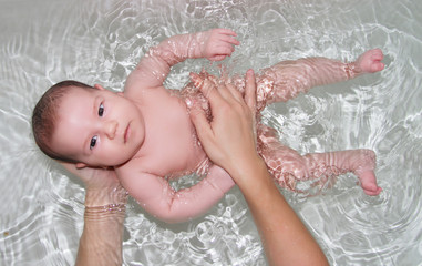 cute baby having bath