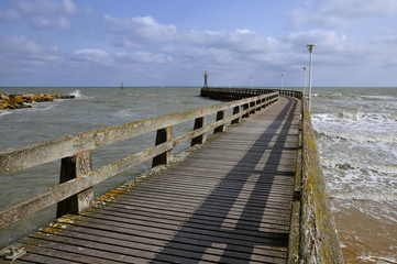 Fototapeta premium Wooden pontoon at Courseulles in France