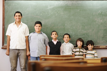 Children in school, from kindergarten, to college boy
