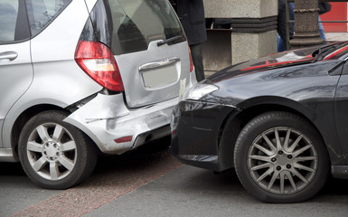 Two cars crash each other