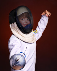Child epee fencing lunge.