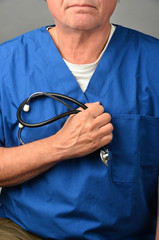Physician Holding Stethoscope