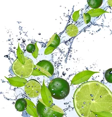 Printed roller blinds Splashing water Limes falling in water splash, isolated on white background