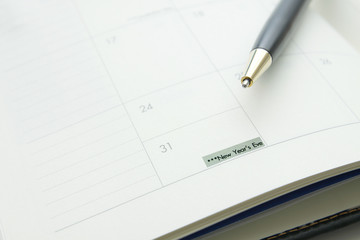 End of Year ,Pen on a book