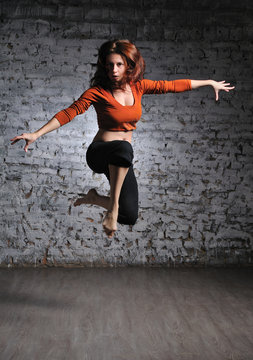 Girl in sportswear jumping