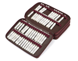many homeopathic globule with other midwife equipment
