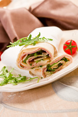 Tortillas with bacon and arugula salad