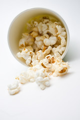 Popcorn in a green paper cup