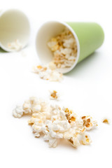 Popcorn in a green paper cup