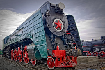 Soviet steam locomotive with red star © Alexandr Blinov